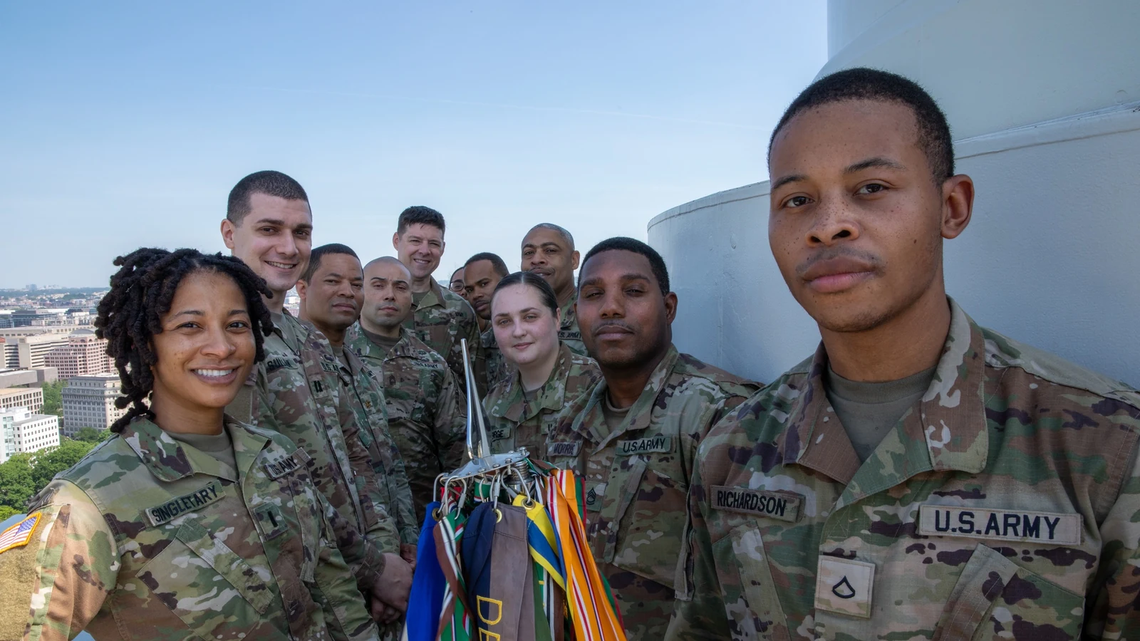 National Guard members stand on the U.S. Capitol dome overlooking Washington.
