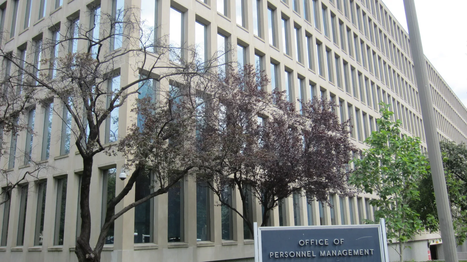Stone federal office building with an Office of Personnel Management sign in Washington.
