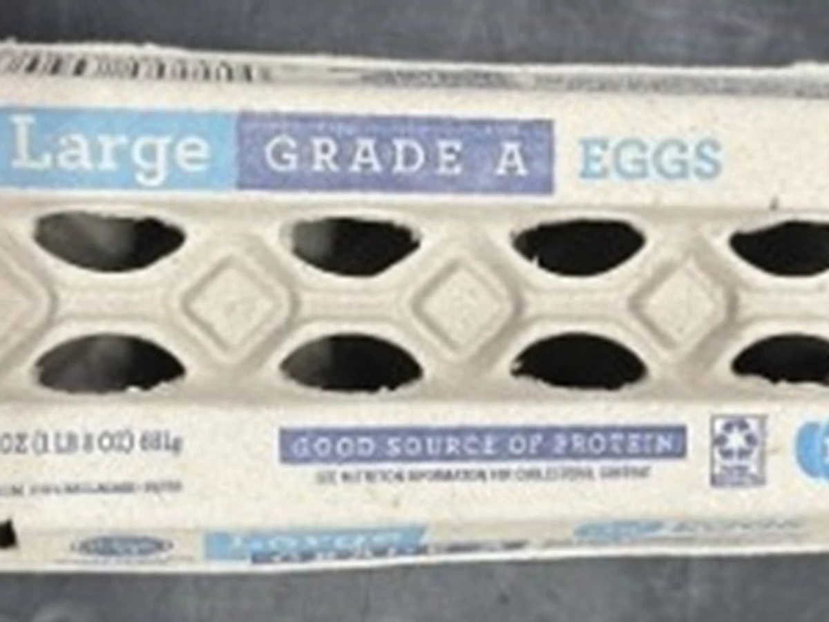 A gray pulp carton labeled Kroger Large Grade A Eggs is photographed from directly above.