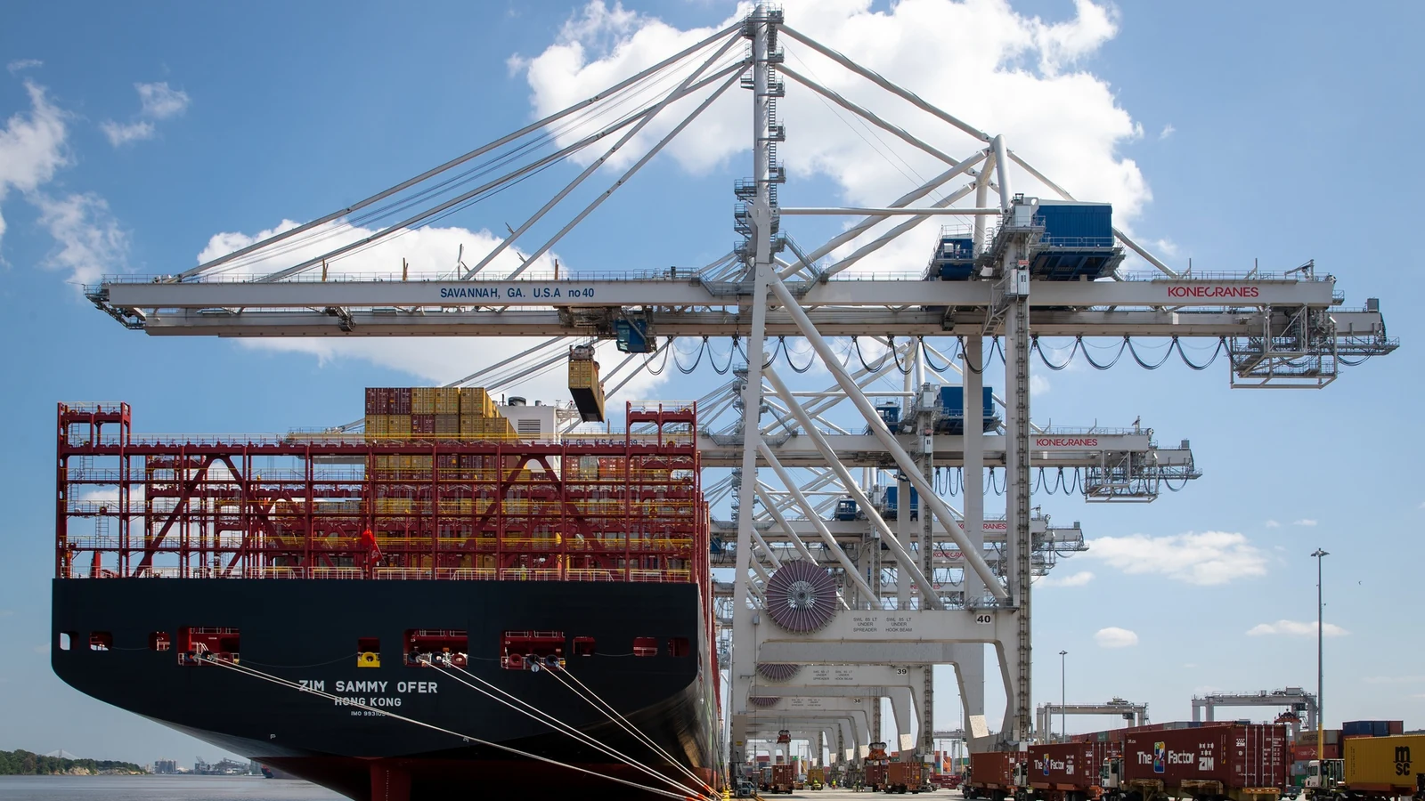 A loaded container ship sits beneath ship-to-shore cranes at the Port of Savannah.